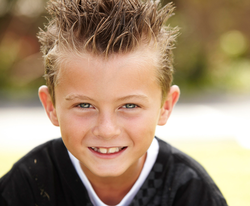 Young boy with spiked up hair