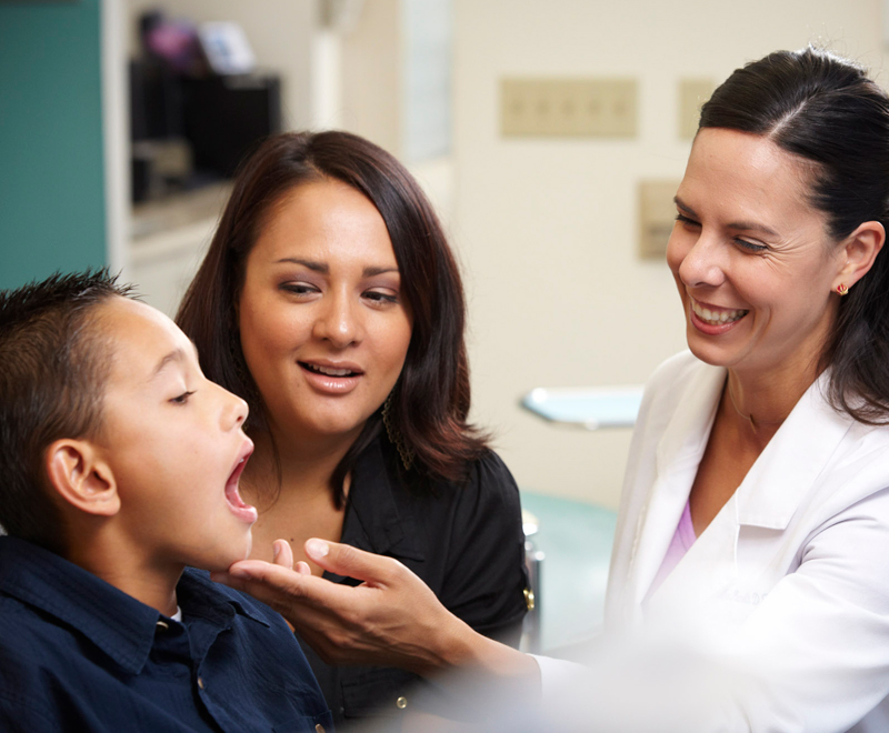 Dr Planells treating a young boy